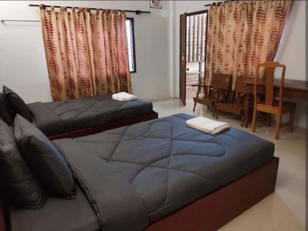 Erawan Guesthouse パークセー エクステリア 写真